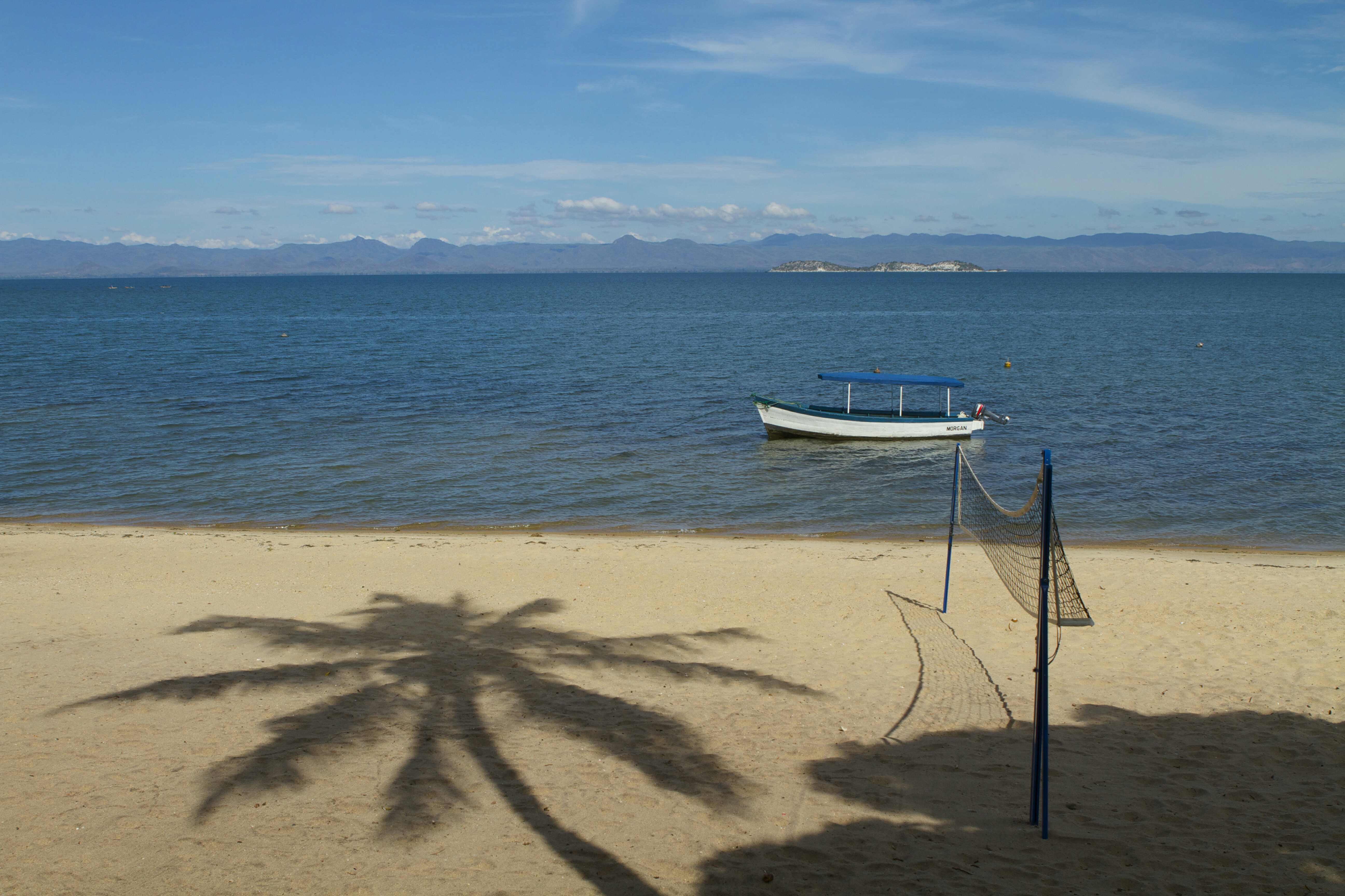 Where is the ideal location for enjoying the blue lake, the golden sands and the blue skies of Lake Malawi?